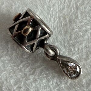 Retired Pandora One World Health charm in sterling silver with 14k yellow gold.